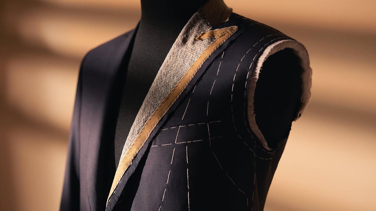 Mastering Elegance: The Craft of the Bespoke Suit Tailor